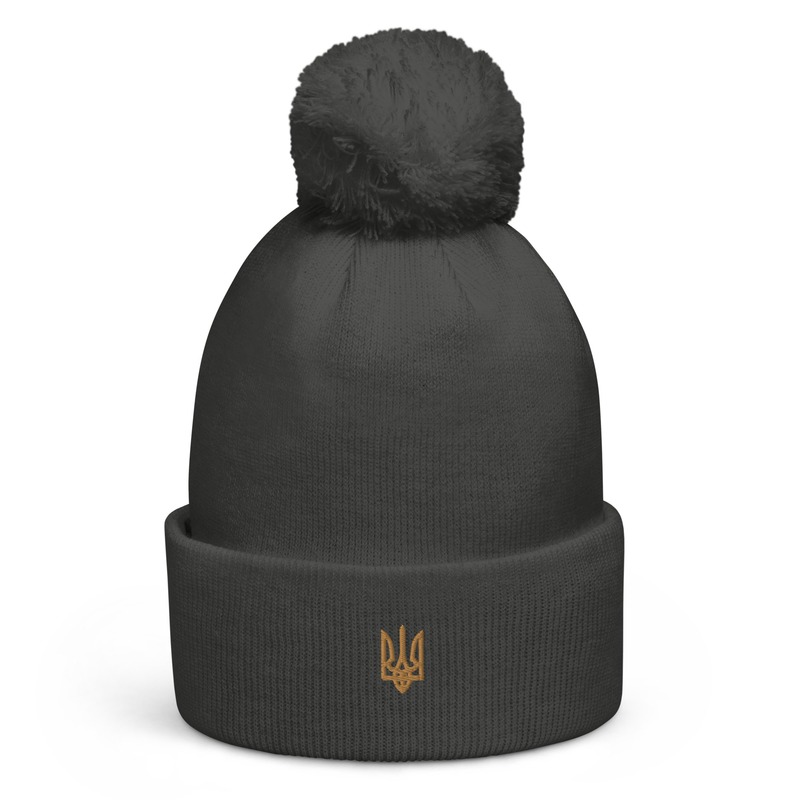 Pom pom beanie with a trident